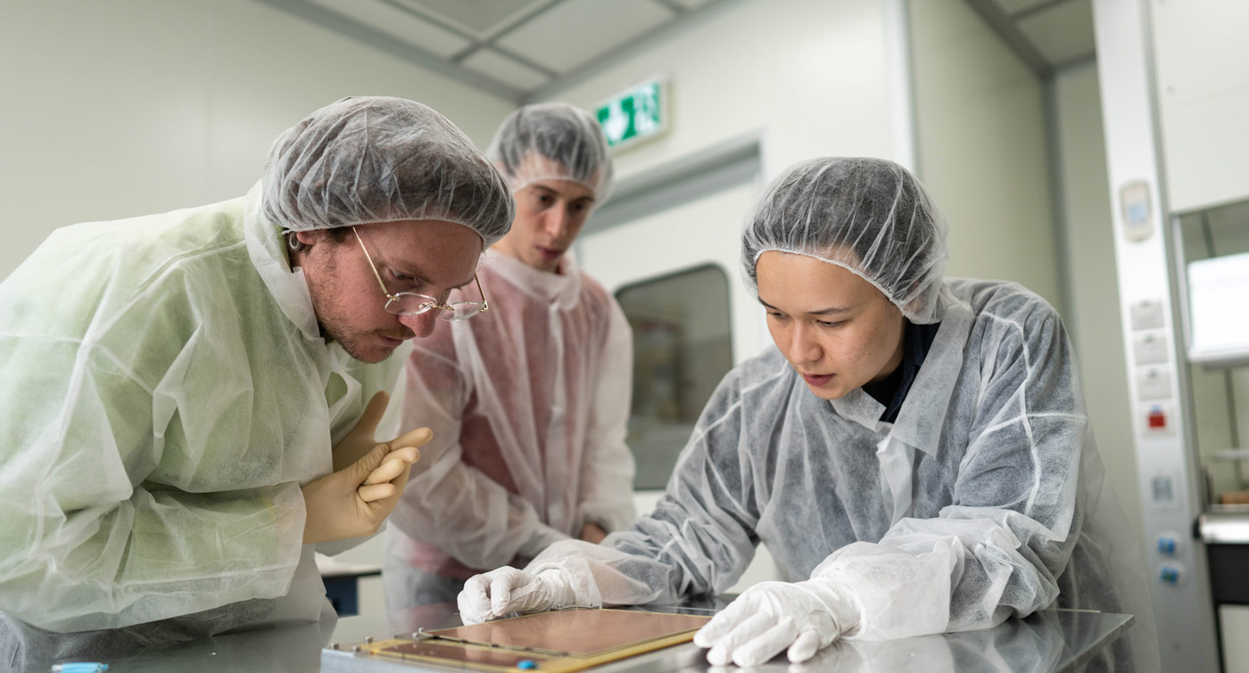 Scientists collaborating in a lab